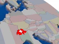 Switzerland with flag highlighted on model of globe. 3D illustration